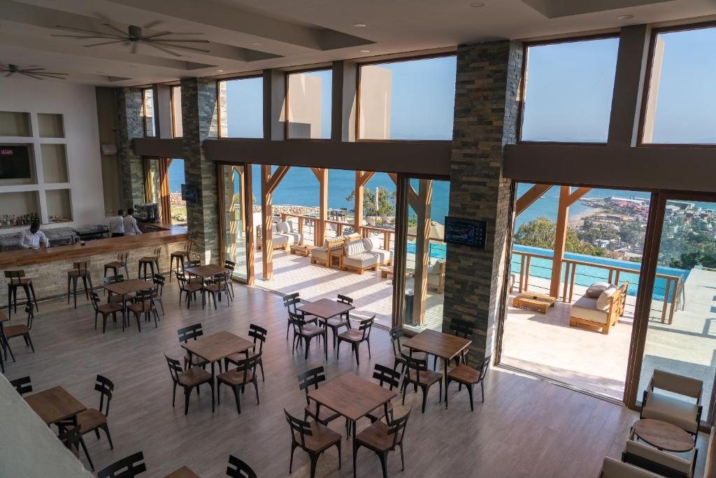 Satama Hotel open-air lounge overlooking the coastline